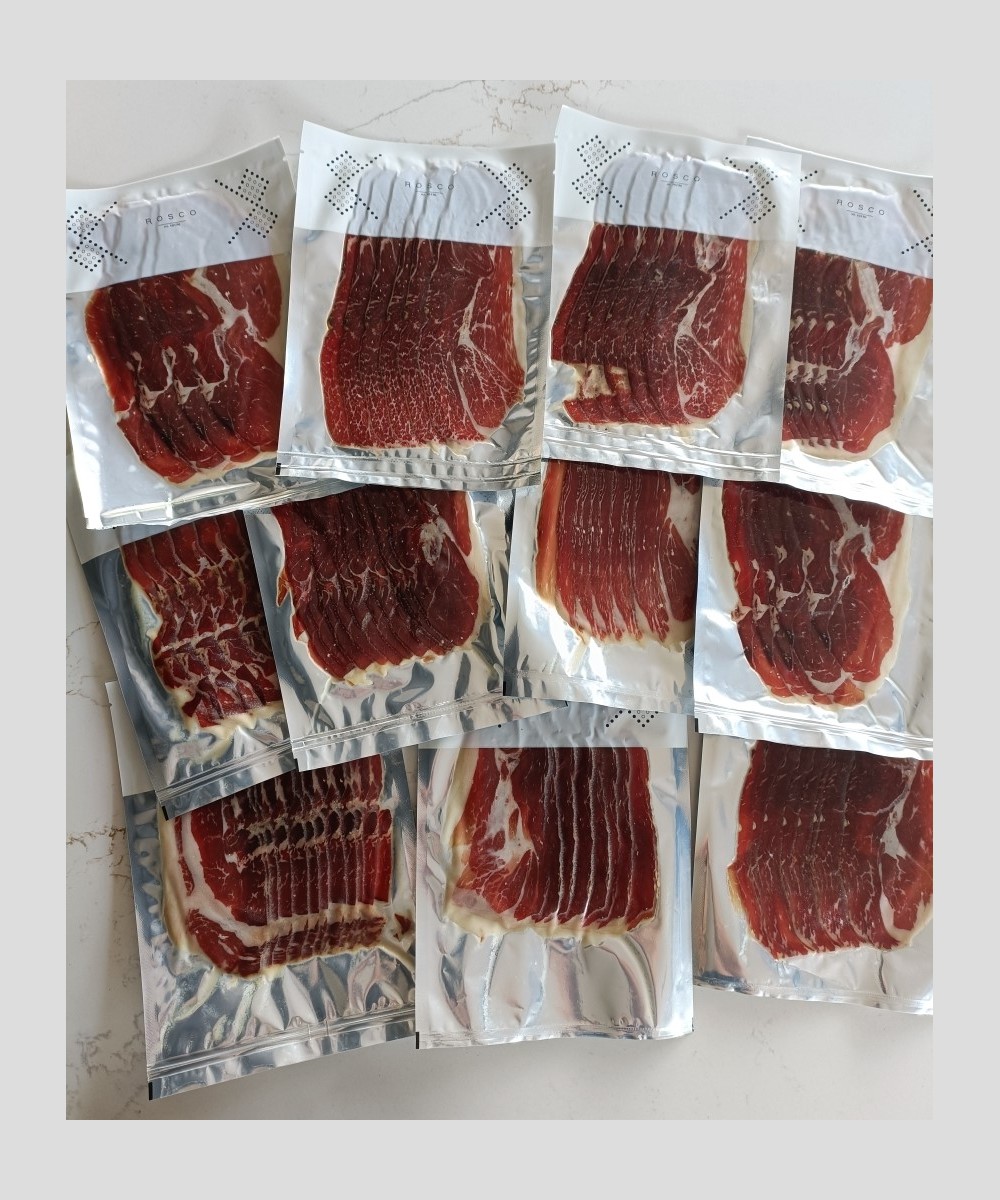 Tranches de jambon Bellota ibérique 100% puroAffinées en Extremadura, en sachets individuels.